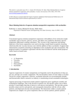 Shear thinning behavior of aqueous alumina nanoparticle suspensions with saccharides