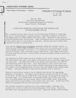 A tractor-mounted applicator for fumigation of strawberry fields