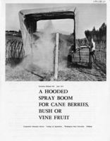 A hooded spray boom for cane berries, bush or vine fruit