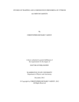 Studies of trapping and luminescence phenomena in yttrium aluminum garnets